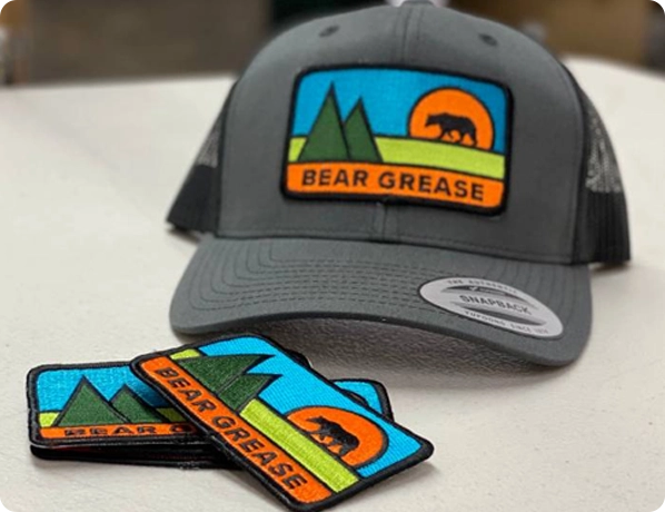 Elevate Your Merch Line with Distinctive Headwear Emblems